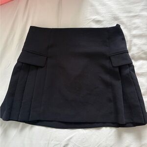 Wilfred Black Pleated Mini Skirt with Flap Detail